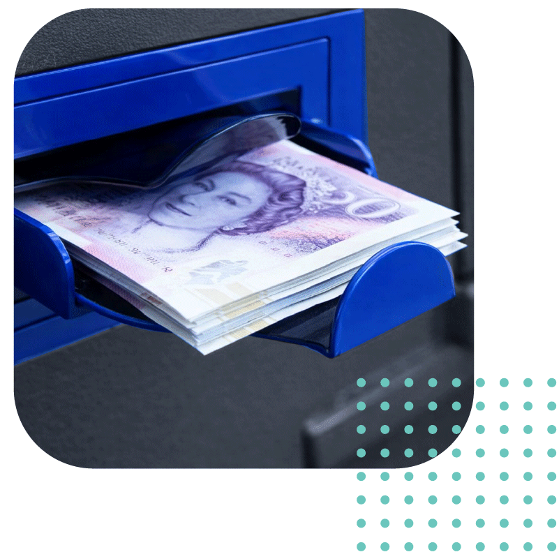 Close-up of a stack of British twenty-pound notes being held in the bright blue entry tray of an automated cash validator safe.